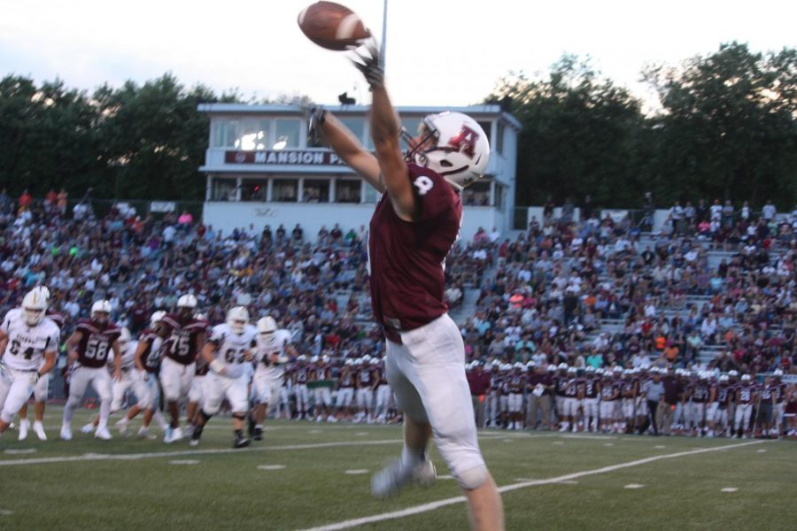 Number 8 Mitchell Luciano attempts to catch a pass during the Hollidaysburg game August 24.  The final score of the game was 27-42.