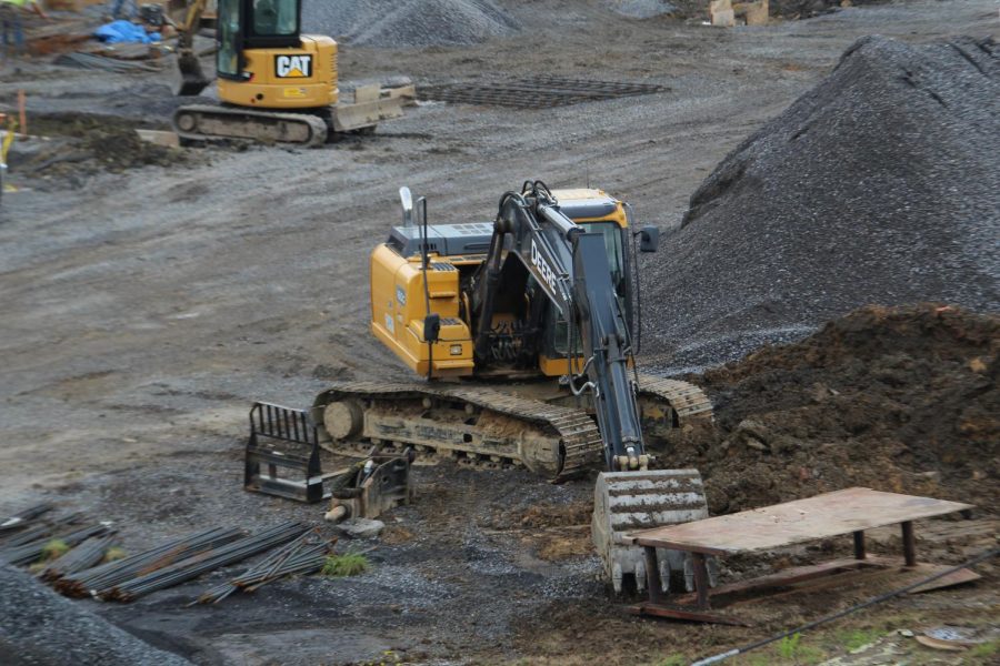 This rocks! The bulldozer is moving rocks to give a more solid foundational structure for the new school. The foundation has been a very complicated procedure due to its former conditions.  