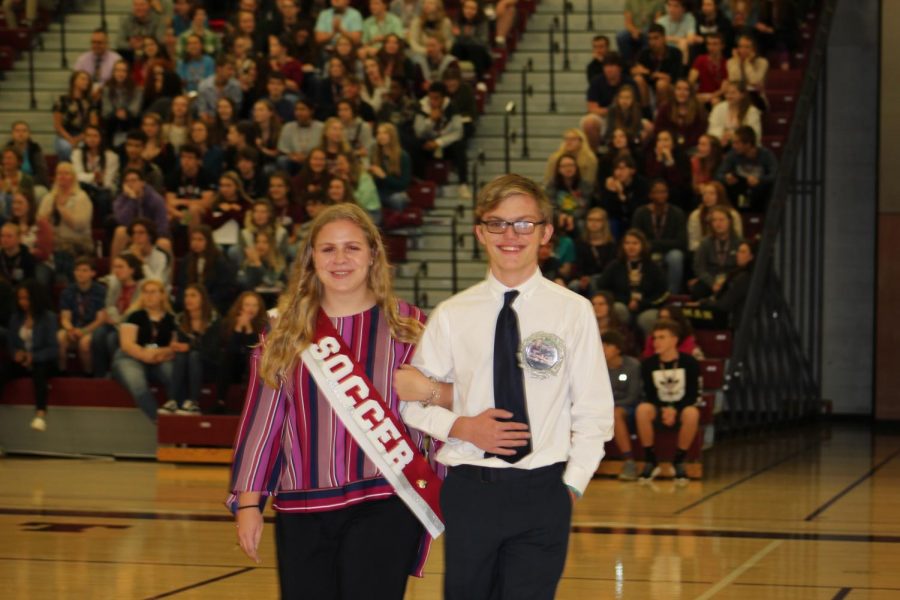 Grace Dull and Preston Michelle take the floor at the Homecoming Assembly, held Thursday Sep. 27 in the gymnasium. Grace represented soccer this past week by participating in all events. The homecoming runners were announced and introduced as well.  