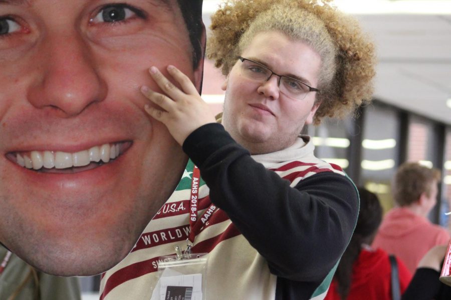 Vote! Corey Minton holds up a cut out of Principal Shane Cowher to encourage students to vote. Dave Bufalini won the contest. 