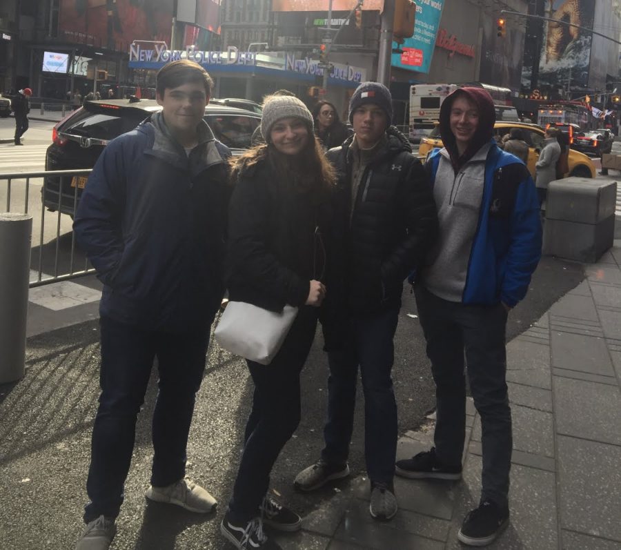 Say cheese! Ben Blackie, Sophia Roefaro, Matt Bowser and Kyle Murray pose for a photo in Time Square. Blackie, Roefaro, Bowser and Murray explored Time Square together after the picture was taken. 
