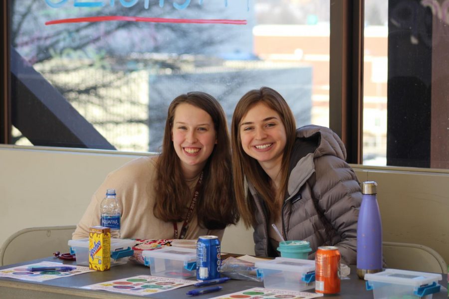 Smile!  Lauren Albright and Brittany Fouse fundraise for FBLA by selling cans of soda to be given on Valentines Day.  