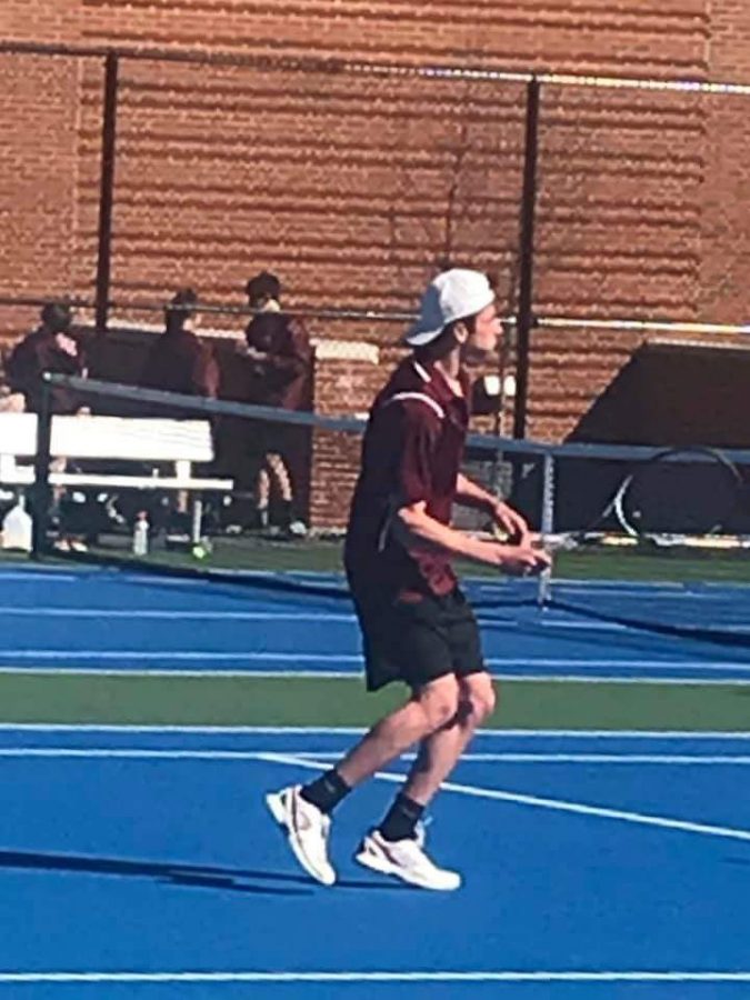 Hit%21+Casey+Rispoli+competes+in+a+recent+spring+tennis+match.+The+boys+tennis+team+will+be+competing+and+hosting+in+the+Mt.+Lion+Classic.+