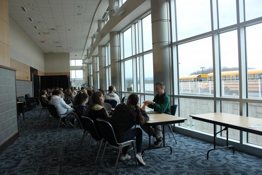 The arrival. 
Students arrive at the Blair County Convention Center on April 17, 2-19 for the Rotary Career Fair. Students waited outside the center patiently as more buses arrived.