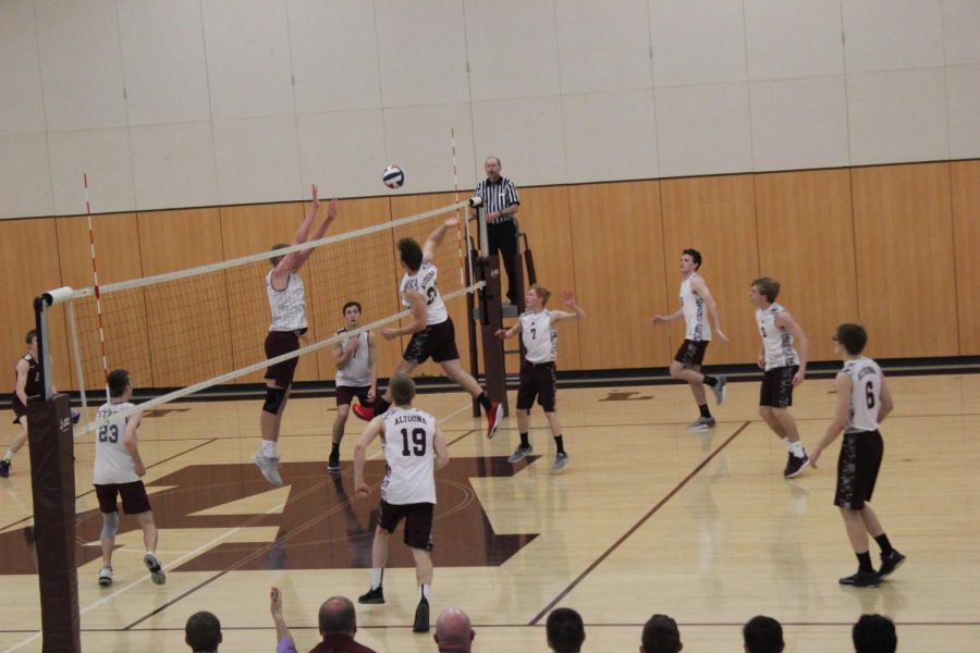 Noah Ruggery spikes the ball  in a game against State College.  This will be his last season with the team as a senior.