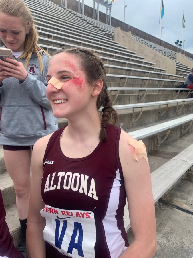 Darrian+Berkheimer+talks+to+her+coach+after+falling+in+the+4x4+race+at+Penn+Relays.+