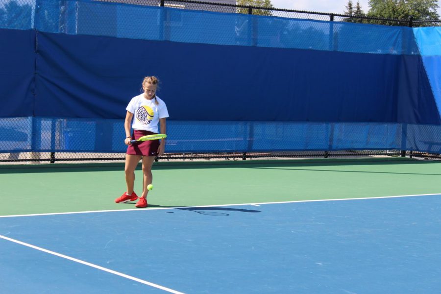 Hit! Alese Rinker gets ready to serve during her match. The girls tennis team won their recent match 5-0 against Mifflin County.