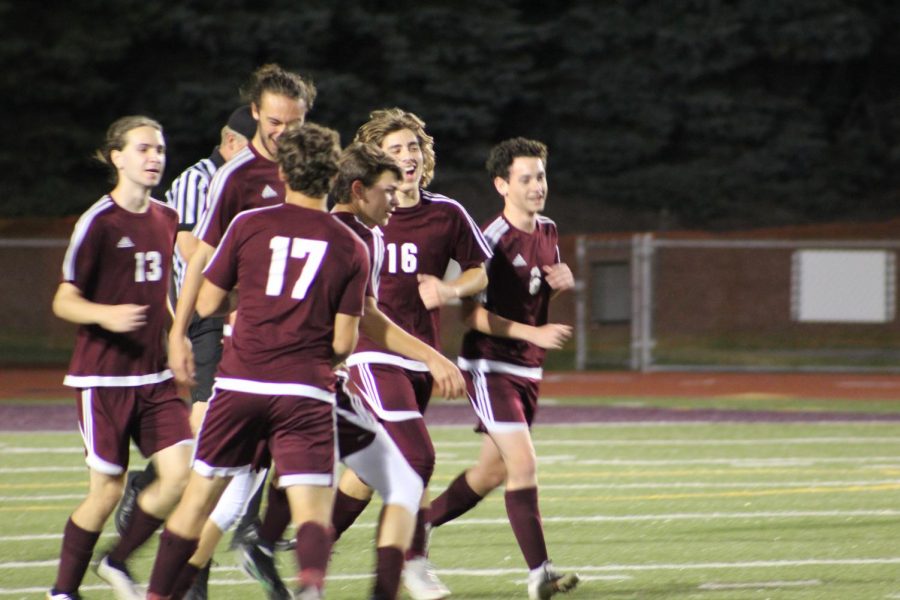 And they're off! Chad Reighard, Zack Kowalski, Jeff barr, Wes Young, Bailey Musselman and Alex Berrardenelli run down the field preparing for their game. 