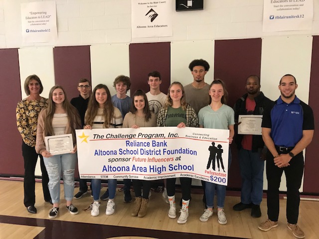 On Oct. 31, the high school held an assembly revolving around the Challenge Program. Pictured on the far left is guidance counselor Sue Fox who manages the Altoona Challenge Program. Students that followed the five requirements of the program were awarded a $200 check during the fall assembly.