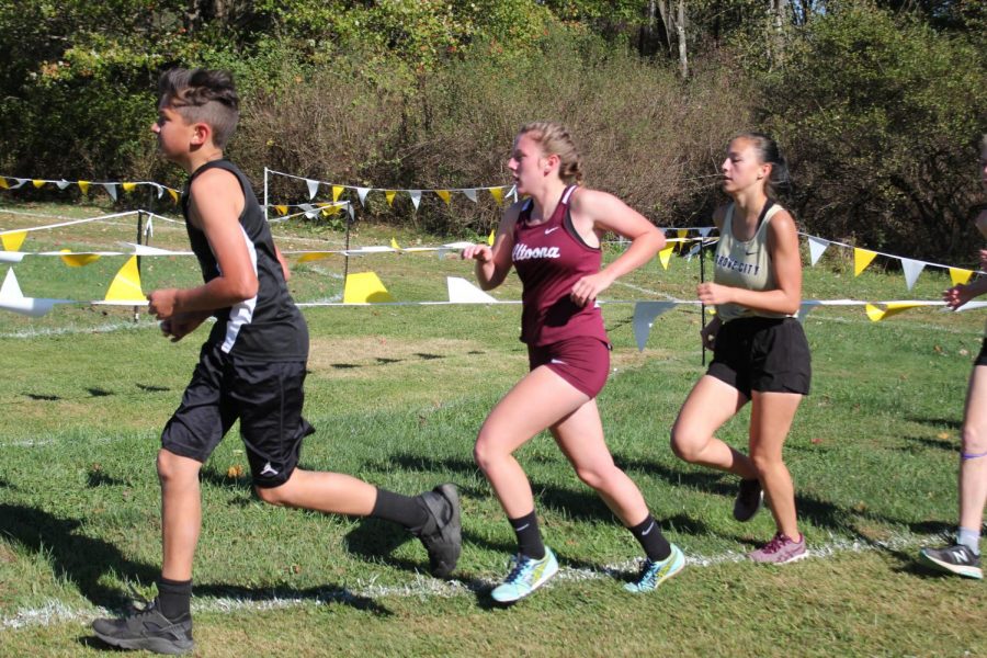 Run
Senior Kylee Wisor starts the race at a meet during the girls cross country season. Her and fellow teammate senior Emily Rentz was inspired to create a race for their senior project. 