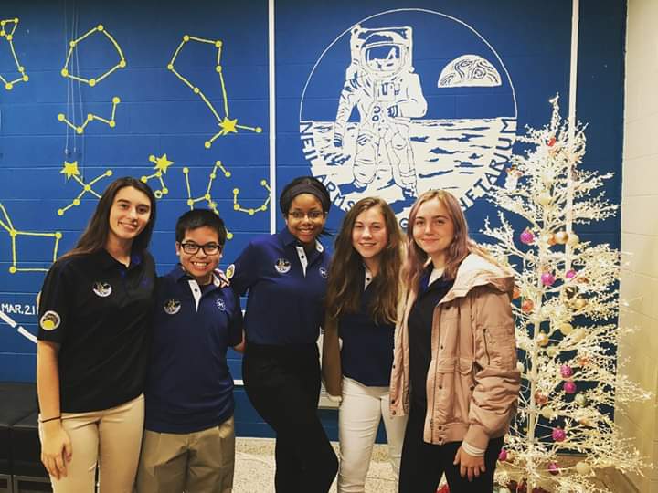 Strike a pose! 
The astronomy officers strike a pose on opening night. All three shows sold out, and there was a bonus round on Dec. 18.