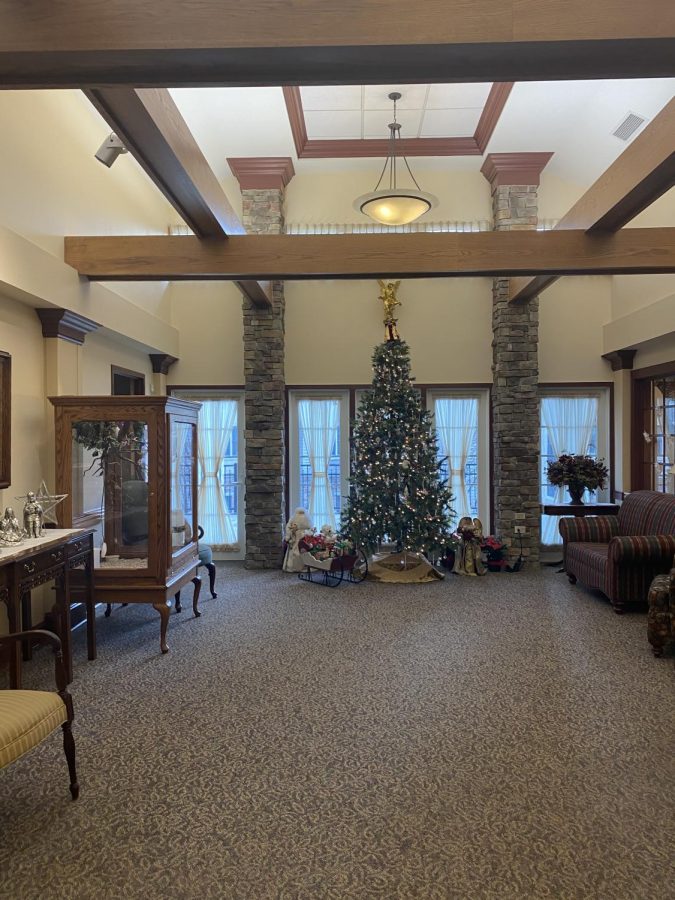 Many Christmas trees were set up throughout Garvey Manor. This one was located in the lobby. Before the Christmas party, members of the junior class executive committee walked the residents around the building to show them all of the trees. 