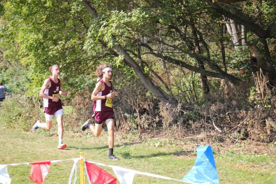 Long Run! Two young men run during a meet. The two people on the boys cross country team ran in one of last years meets. 