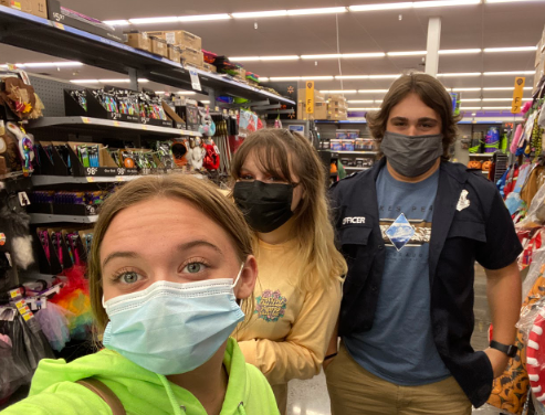 Editor in chief Ben Blackie joined Jocelyn Fetter and Layla Shelow for some fun participating in a Mountain Echo scavenger hunt.  Blackie tried on a police officer uniform as part of the challenge.