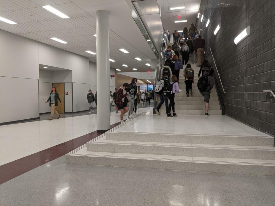Students enter the AAHS last November for the start of a hybrid school day. The students entered the school and headed to their first period classes. Now that its February, students  make plans to return. “Scheduling will start in the coming weeks,” Rogan said.
