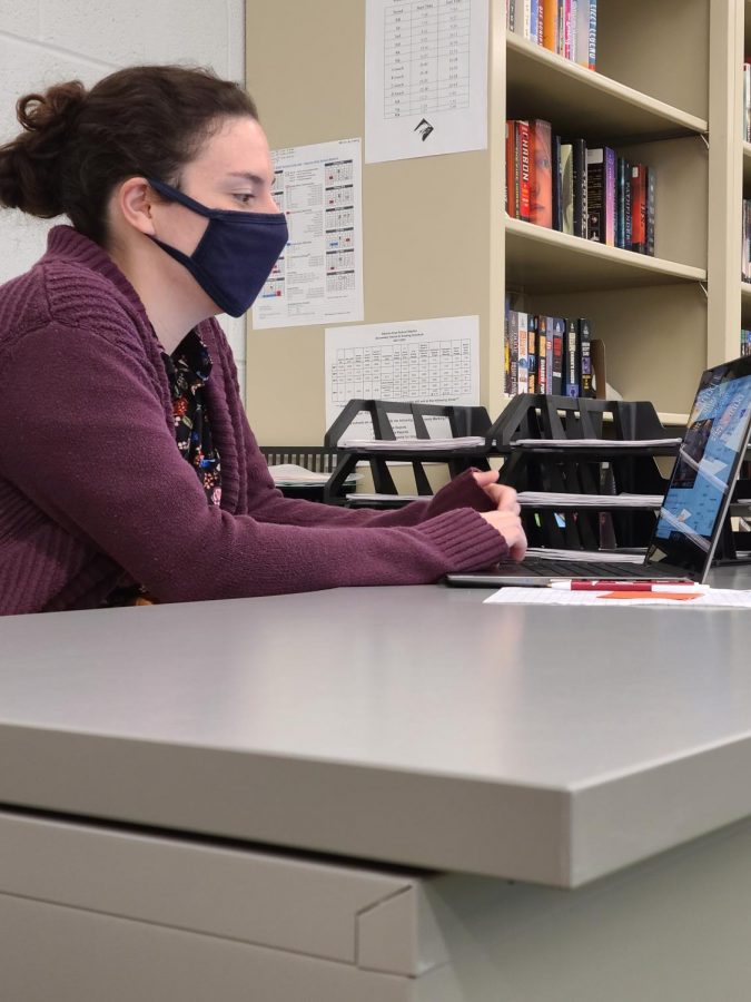 Click clack Audrey Cromell prepares material for her class to learn the next day. Cromwell worked as a substitute teacher last year.