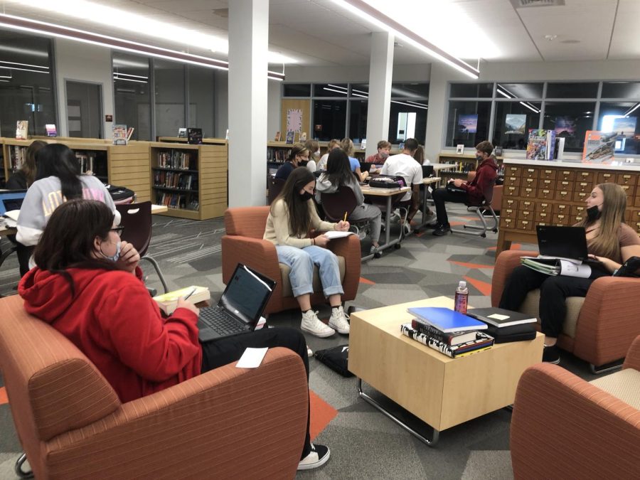 Shhh
Students spread around to work in library. Connor Chywski brings his classes to the library on Thursdays to read and work on their journals.
