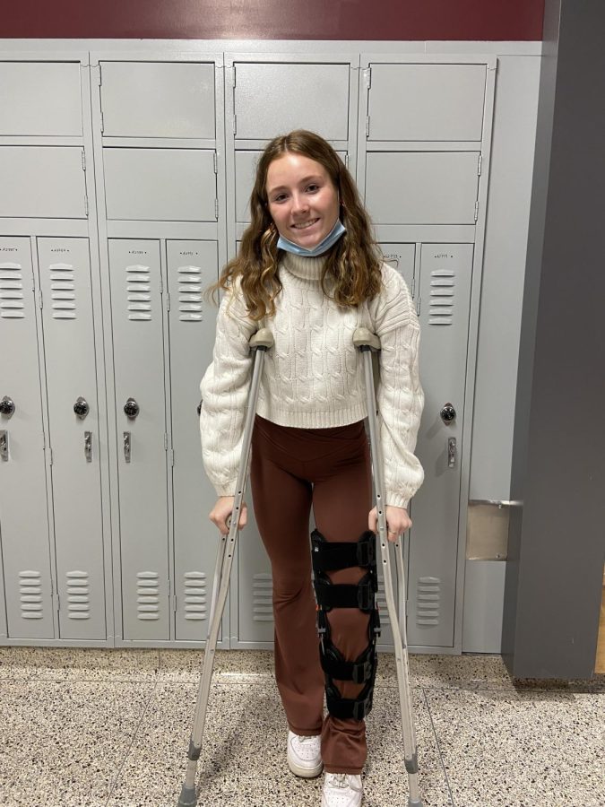 Junior Maura Kiser walks on her crutches throughout the school day. Kiser plans to be off crutches by Nov. 5. 