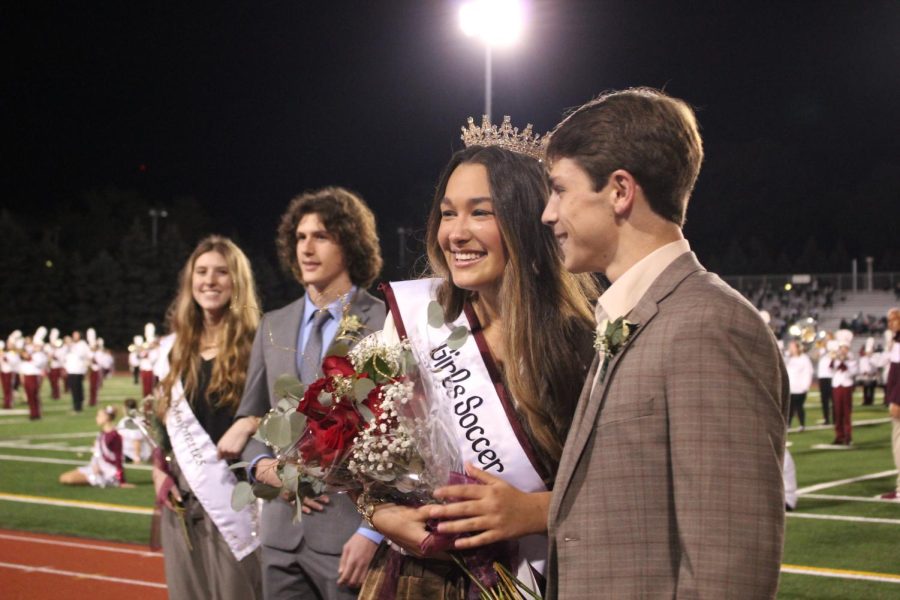 Smiles
Seniors Brooke Harrington and Will Young smile after Harrington is crowned Homecoming queen. She explained that she worked hard during Homecoming week. 