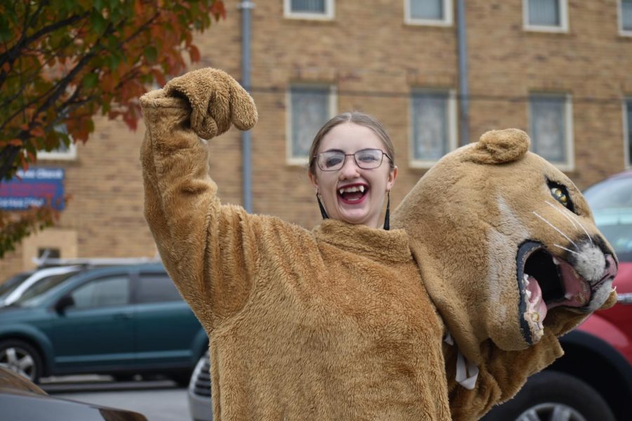 There she is! Sophomore Lillian Roberts poses for a picture. Roberts and Abigail Shearer took turns wearing the mascot costume during trunk or treat.