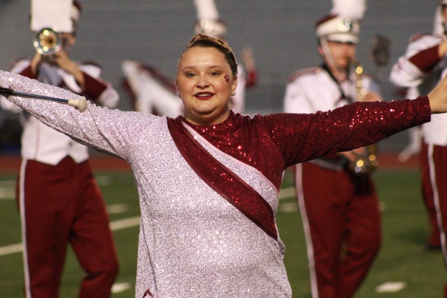 On Altoona. Senior Lilly Noffsker performs halftime at Oct. 3 football game against Williamsport. Noffsker has been twirling with the school since her sophomore year. 