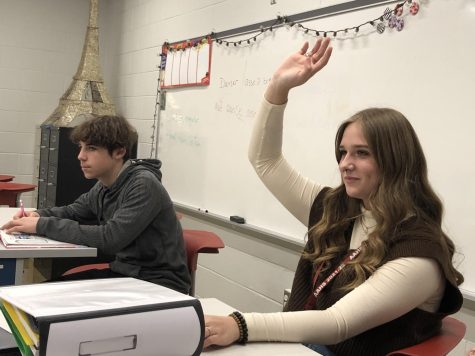 Searching for answers Gianna Stillman raises her hand in French class. Some teachers require participation while others have a more flexible approach. 