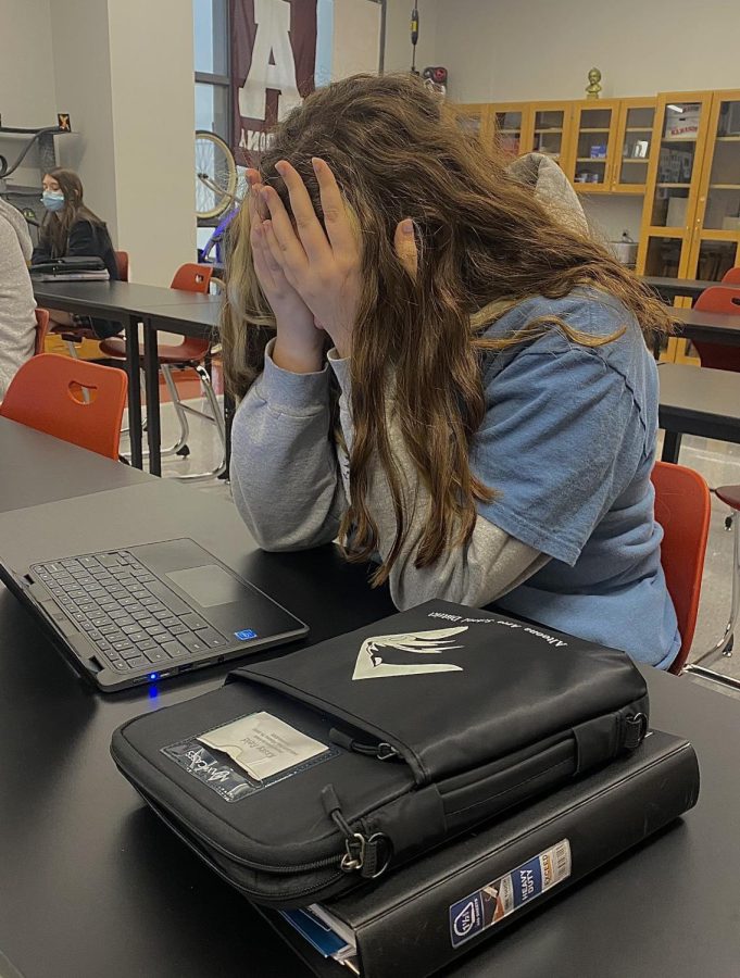 Junior+Kasey+Reid+feels+stressed+after+working+on+her+classwork.+Reid+is+among+many+of+the+students+who+we+have+heard+from+this+year%2C+that+have+felt+this+way.