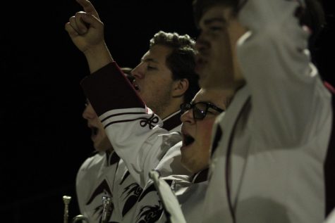 Touchdown Senior Lukas Caracciolo and his fellow band members cheer for the football team as they just scored a touchdown against Carlisle