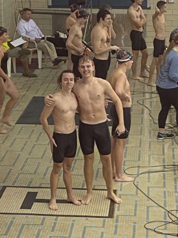 Juniors Steinbugl and Webster pose for the camera at an away meet.