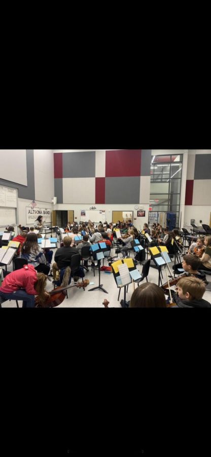 A Helping Hand, On Tuesday, Jan. 11, the high school students assist the elementary school kids in the band room.