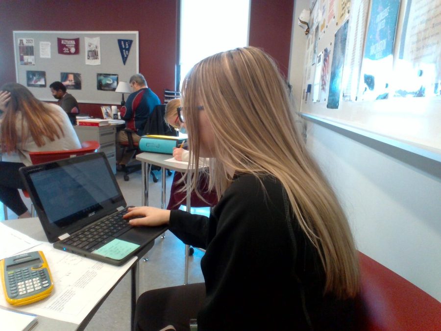 Time to look at grades. Junior Abigail Gensamer looks at her grades on Skyward. Many people use Skyward to see what their current and past grades are. 