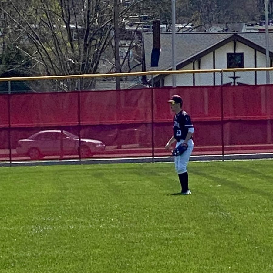 Playing with Passion
Sophomore Blake Nicolini prepares for any fly ball that may come his way. Nicolini played right field and helped get many outs for the team. 