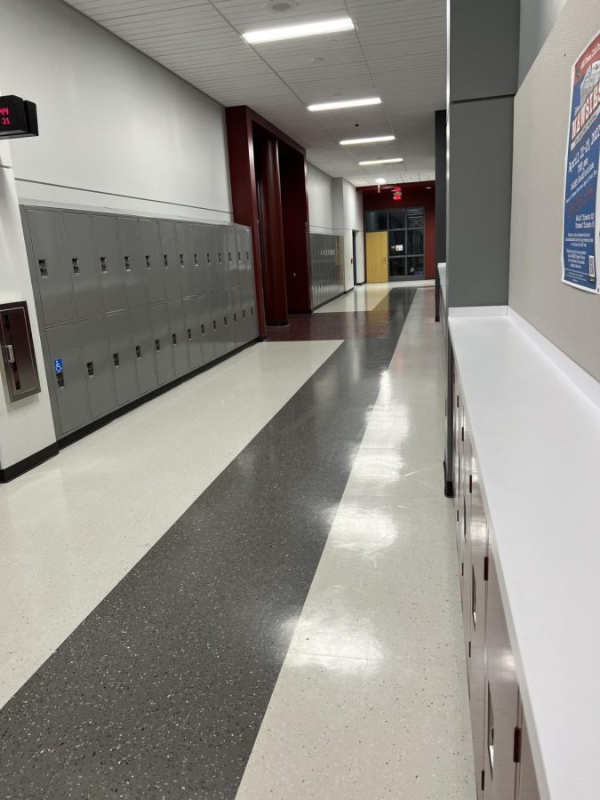 Wait for the bell. These halls are empty at the moment but once the bell rings, they are packed full of students. 