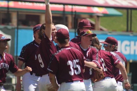 We did it. The boys’ baseball team jumps in excitement as the Curve Classic comes to an end with a win. 