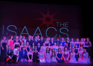 It’s party time. The drama club poses for a picture after the Isaacs. The club had just been awarded Best Production. 