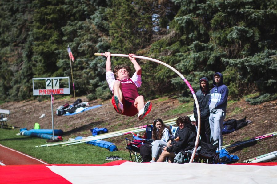 Shooting for the stars Sophmore Nathan Lutz performs pole vault. Others watched as he glided through the air at the Igloo Invitational. 