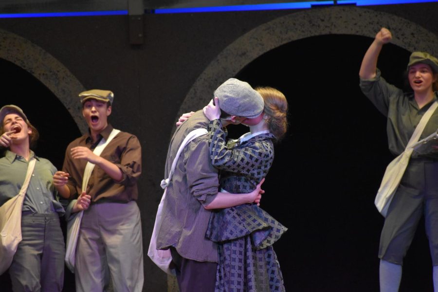 Pucker up. Sophomore Ryan Longstreth and Junior Gracie Crider kiss in one of the final scenes. Longstreth performed as the lead in Newsies. Crider acted as Pulitzers daughter. 