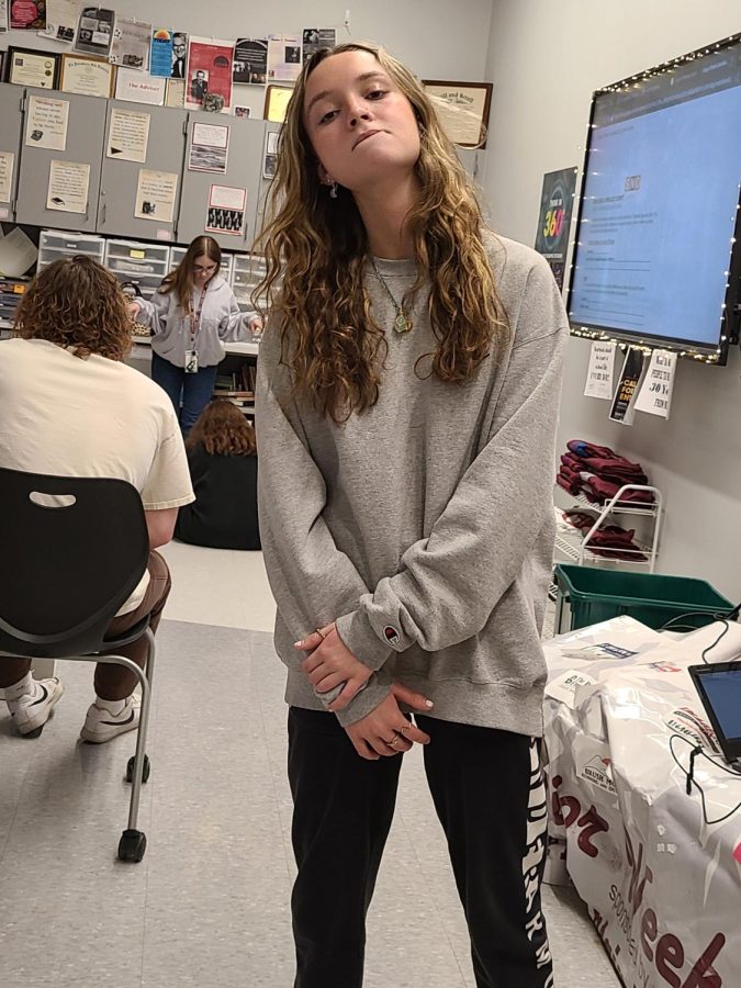 Senior Avery Reid strikes a pose to get a laugh out of the class. Reid enjoys bringing a smile to some of her fellow class mates faces.