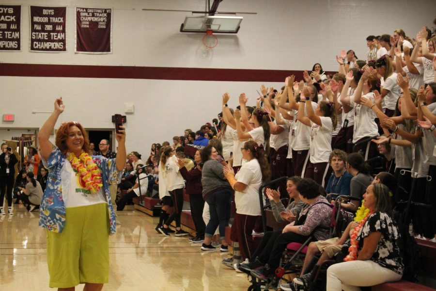 Loud and proud. History teacher Carolyn Kline gets the students hyped up during the pep rally. Kline was the head organizer of the event. 