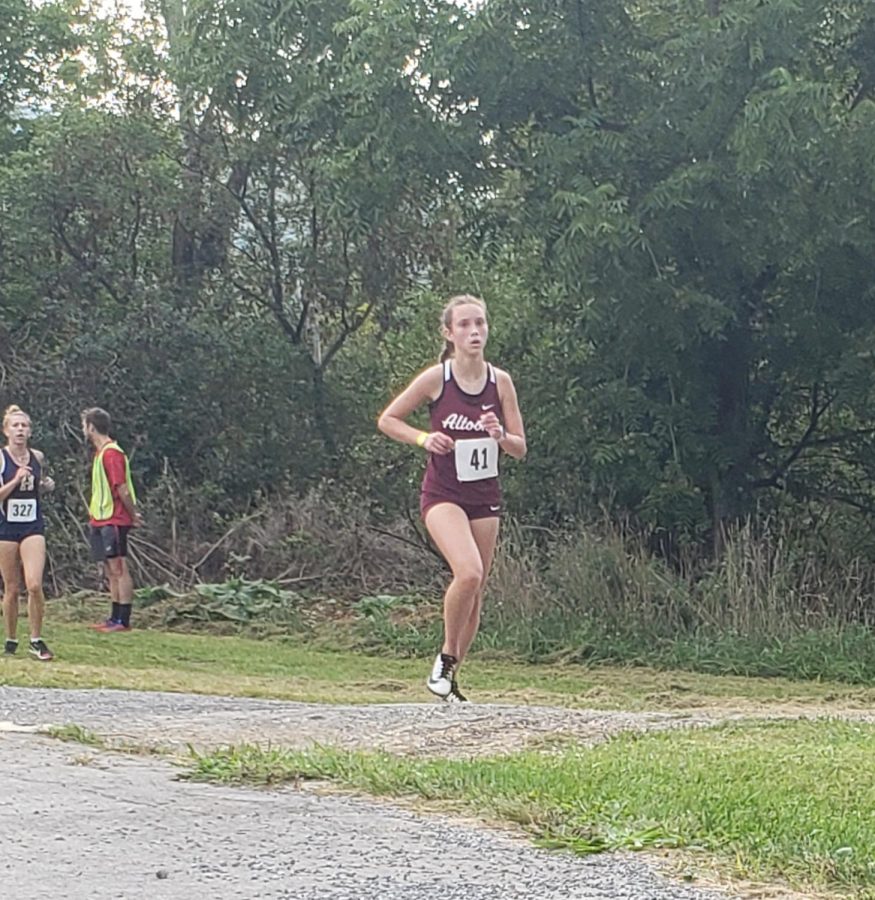 Race to finish. 
Sophomore Mary Stolz races to the finish line. Stolz has been on the team since her freshman year. 