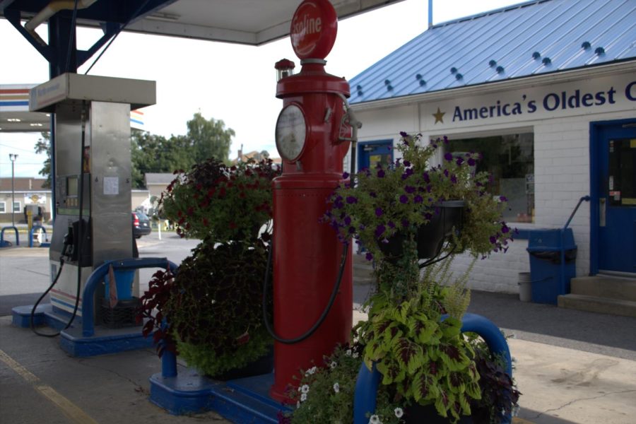Oldest Gas Station in America The red gas pump sits outside of Reighards Gas Station. One of the original gas pumps has stayed outside of the gas station as years have passed. 
