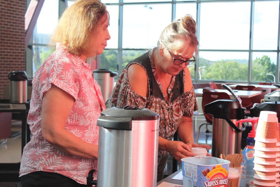 Time to brew! Brenda Lenning brews a mocha as Barb Politi helps. The coffee cart is operated by the Autistic Support and Life Skills classes with the help of the adults in those classrooms.