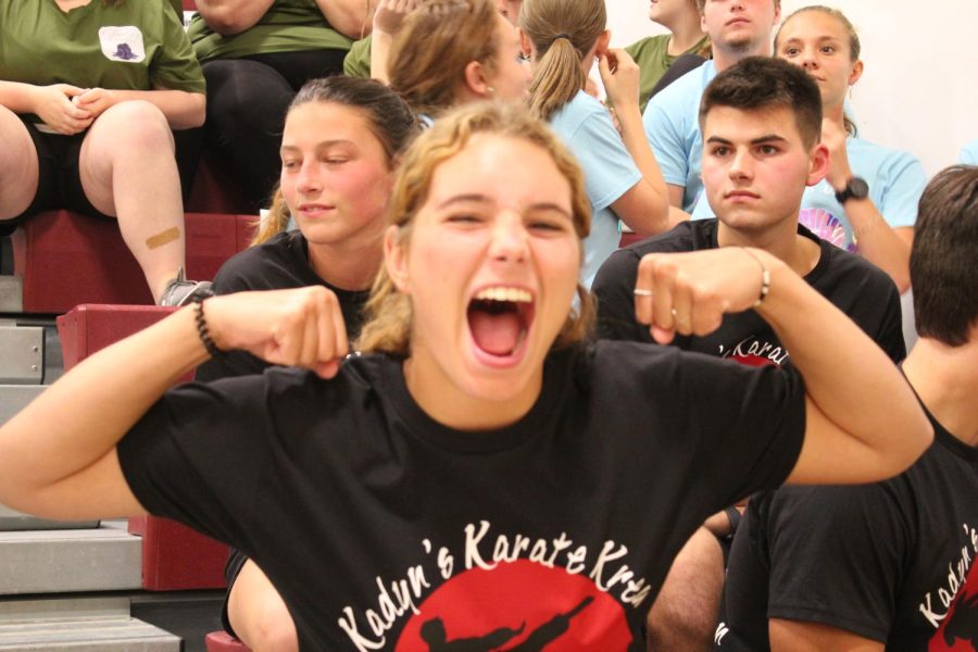 Get hyped. Representing Kadyn Karate Krew, Olivia McMinn cheers from the sidelines.