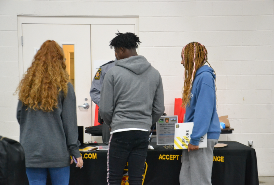Students pause to take a look at what the Pennsylvania State Police have to offer. 