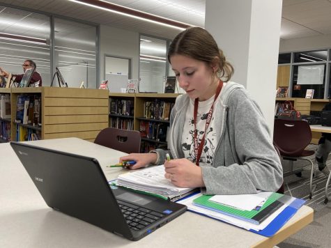 Working hard. Senior Marin Cooney prepares for her tutoring session to start. Cooney was accepted into the National Honors Society at the end of her junior year.