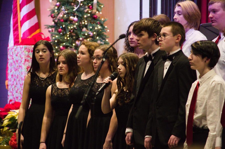 Solo+time.+Senior+Alayna+Huss+sings+a+solo+during+the+holiday+concert.+Some+vocal+ensemble+members+got+the+chance+to+show+their+skills+while+singing+a+solo.+
