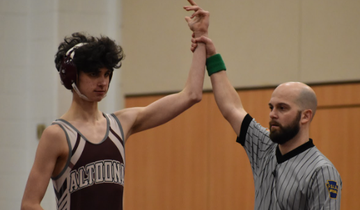 The wresting team prepares to take on Hollidaysburg in an away match.