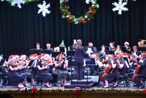The orchestra performs a holiday sing along. It was the last time performing holiday music for this school year.