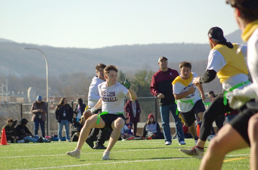 Senior Sean Bettwey races to defend the ball. Bettwey participated in the All-Star students versus staff football game during the turkey bowl. 