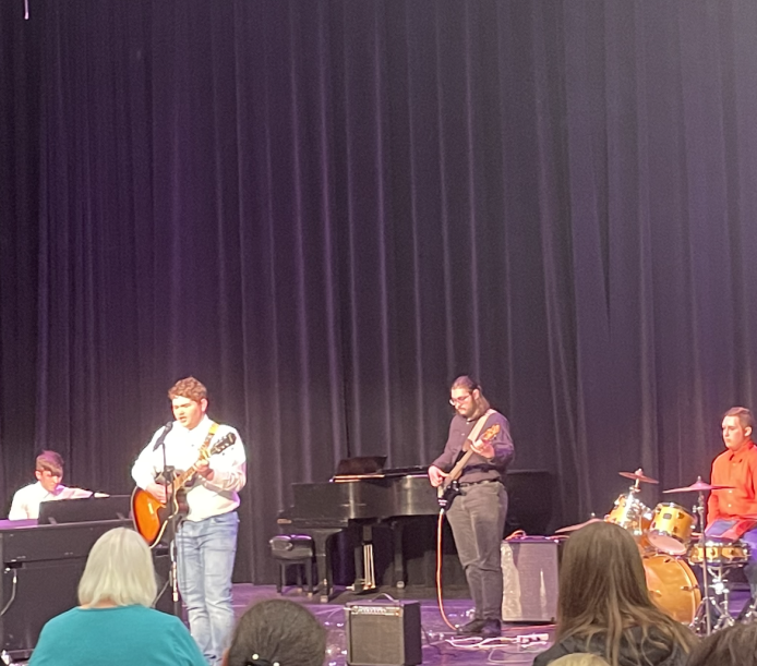 Worship and music. Patrick Reed, Joshua Miller, Roman Elienberger and Warren Leberfinger perform I Thank God by Maveric City Music at the talent show March 3. 